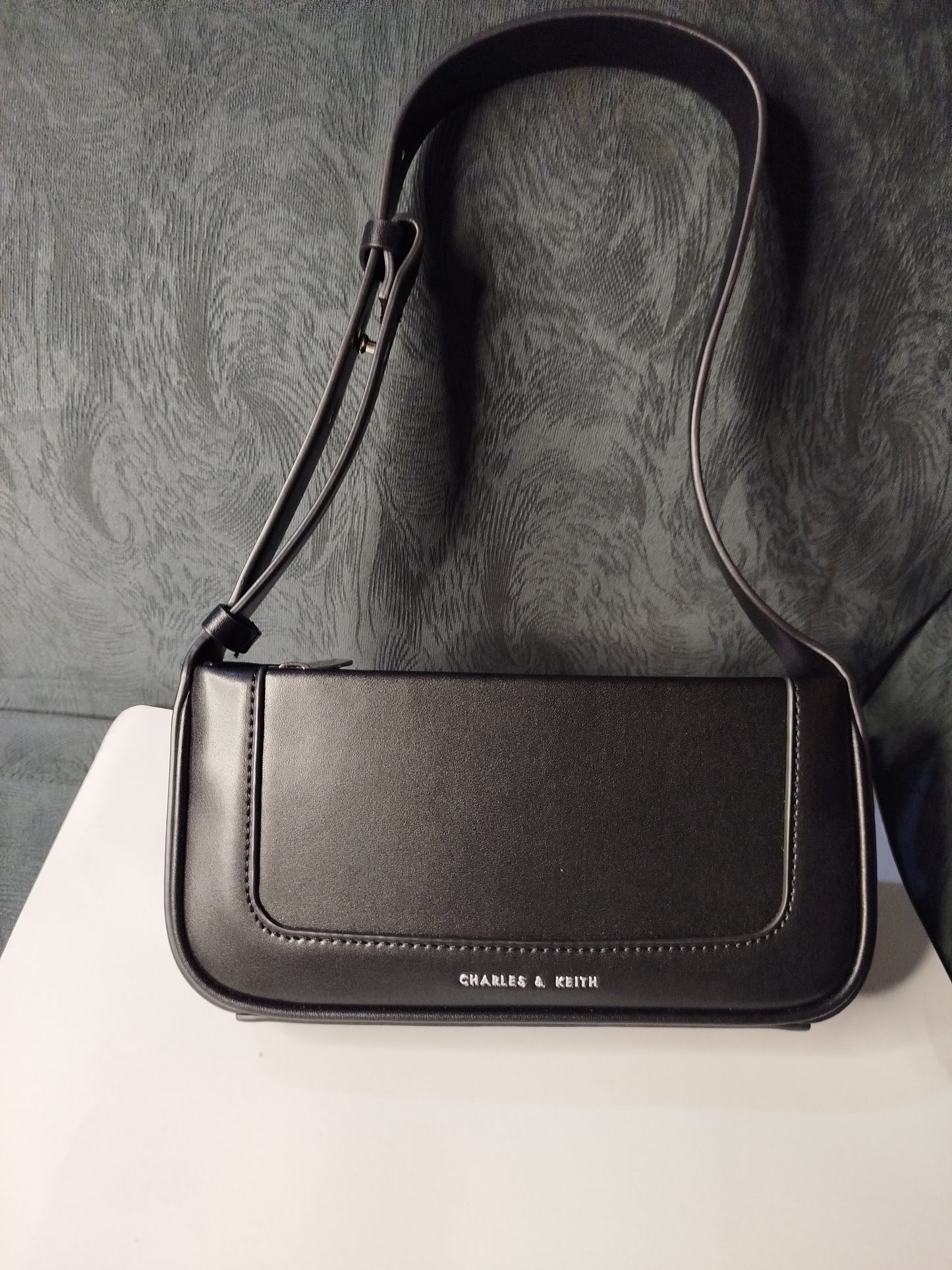 Black minimal Charles & Keith bag