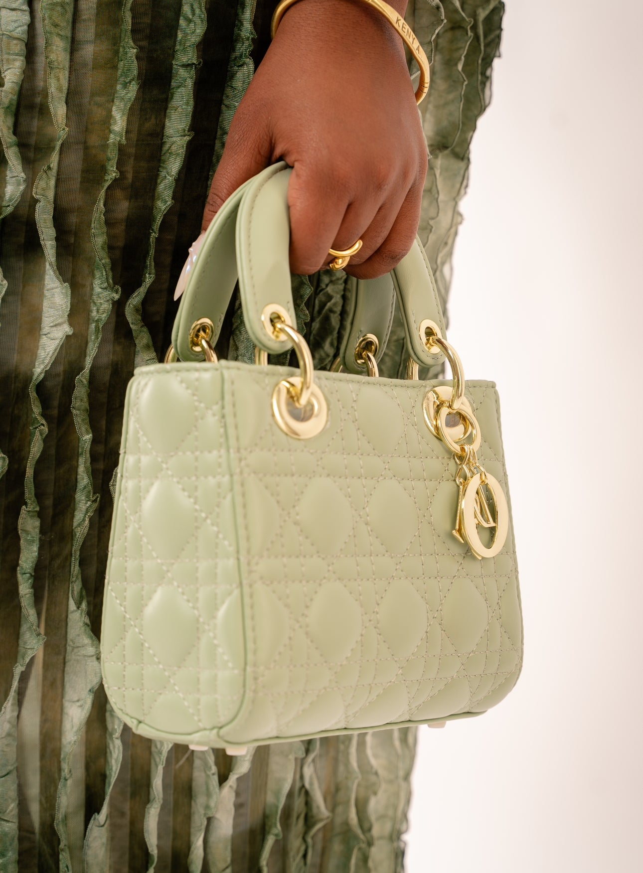 Green bag with Cannage stitching