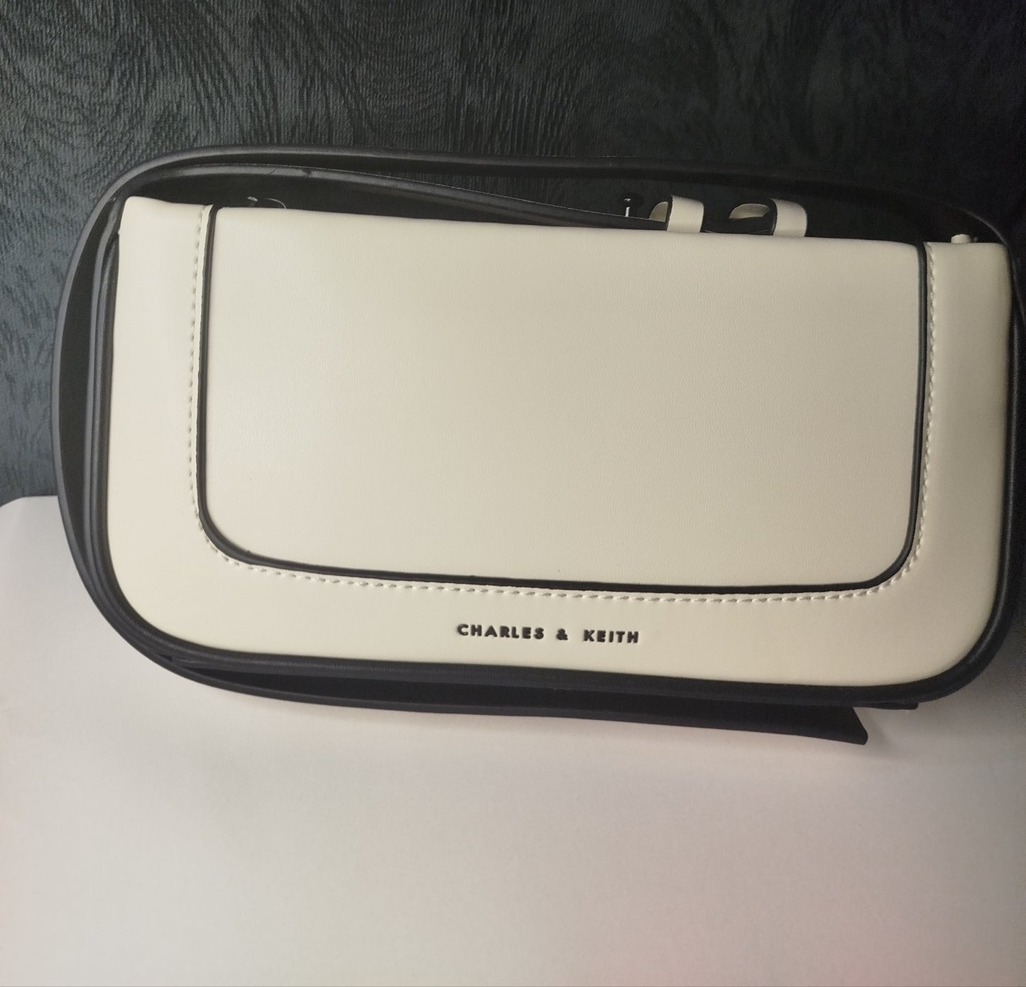 White and black minimal Charles & Keith bag