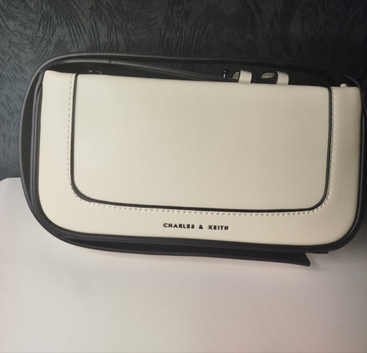 White and black minimal Charles & Keith bag